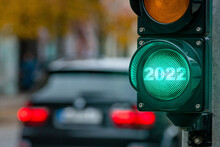 A City Crossing With A Semaphore. Green Light With Text 2022 In Semaphore. New Year Background Concept