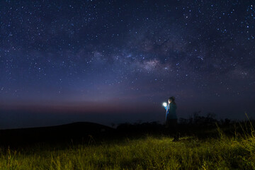 Wall Mural - milky way galaxy at night. image contains noise and grain due to high iso. image also contains soft 