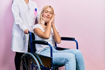 Poster - Beautiful blonde woman sitting on wheelchair with collar neck sleeping tired dreaming and posing with hands together while smiling with closed eyes.