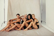 © Jacob Lund - Studio shot of happy women embracing their natural bodies
