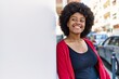 © Krakenimages.com - Young african american girl smiling happy standing at the city.