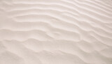 Abstract background of sandy sea on the beach. Wave sand texture