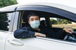 © geargodz - man in medical mask driving a car. for protect covid-19 (coronavirus)