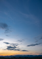 colorful sunset and sunrise with clouds. blue and orange color of nature. many white clouds in the b