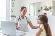 © Graphicroyalty - Shot of a doctor having a consultation with a little girl in her consulting room. 7 year old female patient speaking with her paediatrician in a doctors office