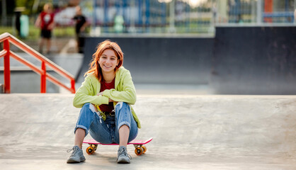 Wall Mural - Girl with skateboard outdoors