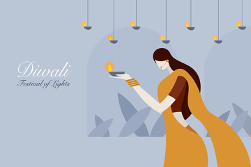 Wall Mural - A woman holding Diwali festival lamps. Concept for Diwali festival greeting