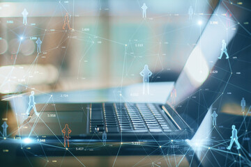 Poster - Close up of laptop on desktop with creative glowing connected people icons on blurry background. Population count and digital transformation concept. Double exposure.