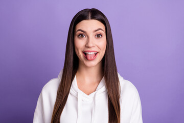 Canvas Print - Photo of young happy funny funky positive woman stick out tongue good mood isolated on purple color background