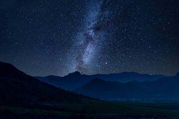 Wall Mural - milky way over mountains