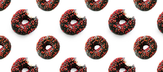 Wall Mural - Black bited donuts with red glaze on white background seamless pattern top view. Food dessert flatly flat lay of delicious sweet nibbles chocolate donuts banner