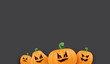 © zmiter - Halloween Horizontal web Banner or poster with Halloween scary pumpkins isolated on grunge grey wall background. Funky kids Halloween background with space for text and funny pumpkins