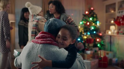 african american grandparents visiting for christmas hugging family giving presents enjoying festive