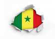 © Royal - Flag of Senegal underneath the ripped paper
