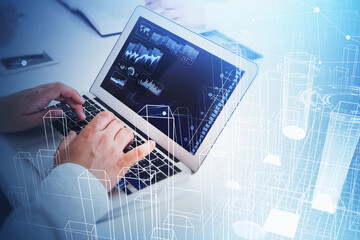 Poster - Businessman wearing white shirt is typing on laptop