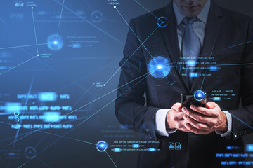 Poster - Businessman wearing formal suit is typing message on smartphone