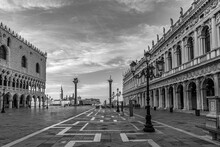 View To St. Mark's Square In Early Morning With Doges Palace And Pillar With Dragon At Horizon In Venice