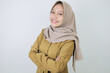© Reezky - Happy government worker women standing confidance. PNS wearing khaki uniform.