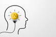 © Monster Ztudio - Creative thinking ideas and innovation concept. Paper scrap ball yellow colour with light bulb and head human symbol on white background