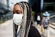 © Rawpixel.com - Portrait of black woman wearing mask