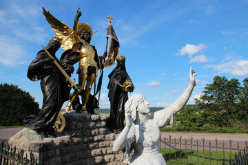 statue of joan of arc (?) with holy characters in domremy-la-pucelle in lorraine (france) 