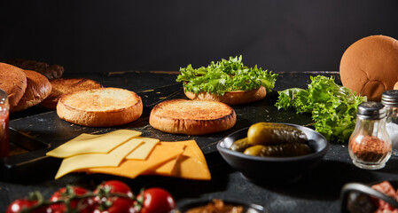 Wall Mural - Panorama banner displaying ingredients for a gourmet beef burger