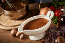 Gravy Boat With Serving Of Delicious Rich Brown Sauce Or Gravy