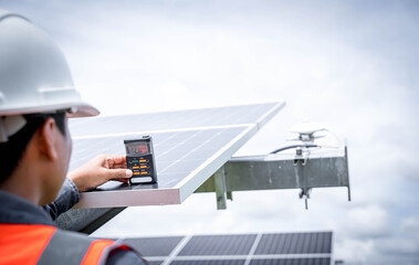 Technicians are checking the irradiance of the solar panel in the solar power plant so that the power generation can operate at full capacity. Alternative energy to conserve the world's energy