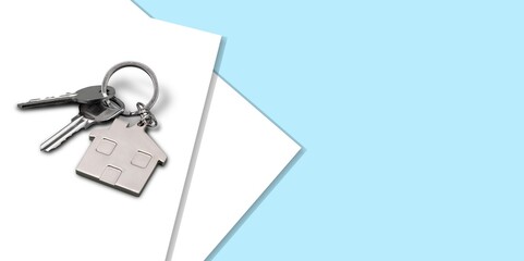 Sticker - Keys and house keychain on real estate document, contract agreement to buy or construction