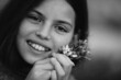 © Scopio - Grayscale portrait of a happy girl smiling