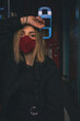 © Scopio - Portrait of a Woman wearing red face mask