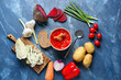 © Pixel-Shot - Bowl of tasty borscht and ingredients on color background