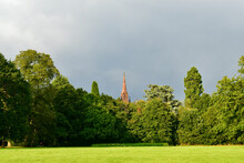 Landscape With A Medieval Church Spire Behind Trees, Coventry, England, UK