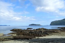 A Beautiful View Of A Shores At Low Tide Surrounded By Beautiful Calm Ocean In The Background, In Gwaii Haanas National Park Reserve, Haida Gwaii, British Columbia, Canada