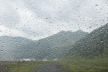 Canvas Print - Rain dropes on the car glass