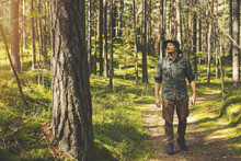 Forest Ranger Or Forester On The Walk
