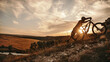 © kegfire - Cyclist with mountain bike at sunset