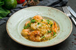 © Алиса Королевская - Fettuccine with shrimp on creamy sause on dark stone table
