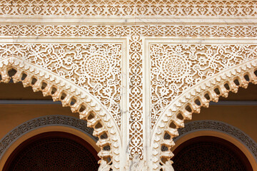 Poster - Beautiful ornate carvings and decorative detail on the walls and arches of the ancient City Palace in Jaipur in Rajasthan, India.