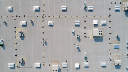 Wall Mural - drone view of a commercial roof top