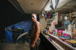 © Hernandez & Sorokina/Stocksy - Circus Artist Near To Kiosk With Sweets