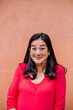 © Erin Brant/Stocksy - Smiling Asian woman