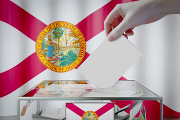 Wall Mural - Florida flag, hand dropping ballot card into a box - voting, election concept - 3D illustration