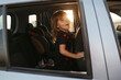 © Irina Polonina/Stocksy - A little girl sitting in a car.