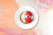 © Vaidas Bucys/Stocksy - Elegant cake dessert on white plate on marble background