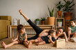 © Eloisa Ramos/Stocksy - Pregnant mother relaxing with her children at home