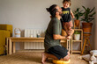 © Eloisa Ramos/Stocksy - Family father enjoying his fatherhood at home