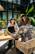 © Luis Velasco/Stocksy - Colleagues Having An Interview In A Office Workplace.