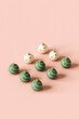 © Giada Canu/Stocksy - xmas balls on pink background