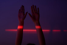Neon Red Light On Hands